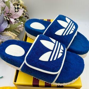 Men’s Gucci, X Adidas, limited edition slides size 9, made in Italy